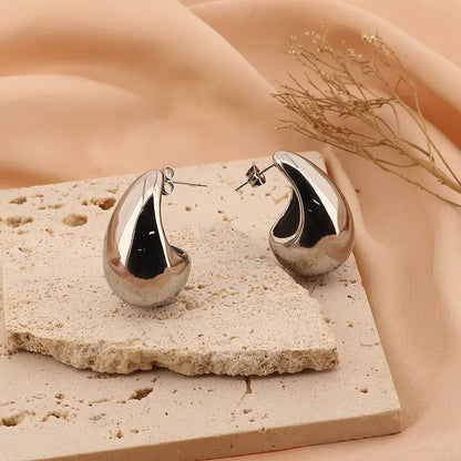 Trendy Hollow Water Drop Earrings in Stainless Steel