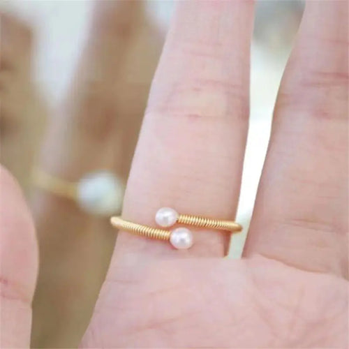 14K Gold Pearl Ring with Winding Design